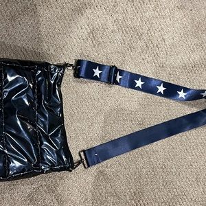 Navy patent shiny crossbody. Wore once. Cool strap🌸